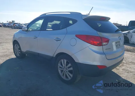 2013 Hyundai Tucson Limited z USA, uszkodzony, nr VIN KM8JU3AC4DU555613